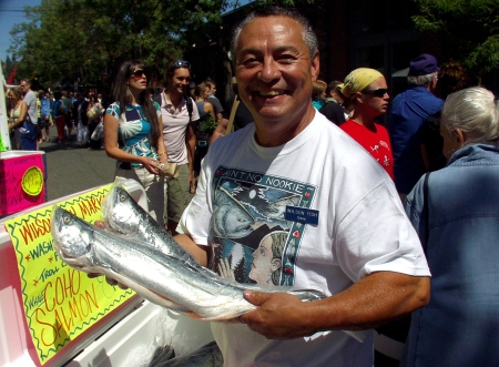 Gene Panida of Wilson Fish proudly showing of his "Bag-O-Fish." Photo copyright 2009 by Zachary D. Lyons.