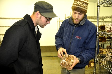 Will Lockmiller of Sno-Valley Mushrooms explaining the process to our own Gil Youenes. Photo copyright 2012 by Zachary D. Lyons.